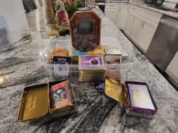 pokemon cards lot over 1,000 card, tins, and covers - Image 3