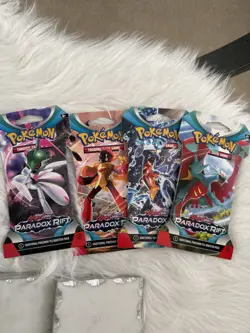 Pokemon TCG Paradox Rift Sleeved Booster Pack Set - 4 PACKS 1 Of Each ART - Image 1