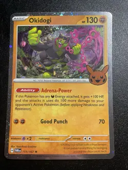 Okidogi 111/167 SWIRL Trick or Trade BOOster Cosmos Holo NM Pokemon Card 2024 - Image 1
