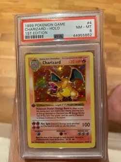 1999 POKEMON BASE SET 1ST EDITION #4 CHARIZARD HOLO PSA 8 - Image 1
