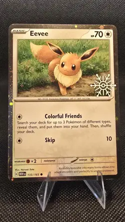 Eevee 133/165 Holiday Calendar Snowflake Stamped Cosmos Holo Pokemon Card - Image 1