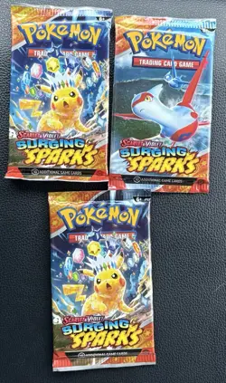 POKEMON SURGING SPARKS SCARLET & VIOLET (3)ct FACTORY SEALED BOOSTER PACK LOT! - Image 1