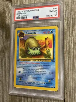 PSA 8 1999 POKEMON FOSSIL OMANYTE 1ST EDITION - Image 1