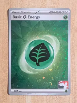 Grass Energy SVE 009 NM Cosmos Holo Prize Pack Series 7 [Play! Pokemon Stamp] - Image 1