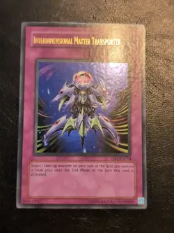Yu-Gi-Oh! ULTRA RARE HOLO CARD INTERDIMENSIONAL MATTER TRANSPORTER DR1-EN214 VLP - Image 1
