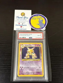 1999 POKEMON BASE SET UNLIMITED #1 ALAKAZAM-HOLO PSA 8 - Image 1