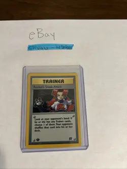 Pokemon Trainer Card: Rocket’s Sneak Attack 16/82 Holo 1st Edition - Image 1