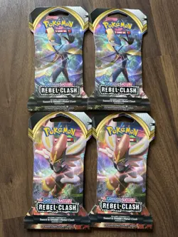 Lot of 4 Pokemon TCG Rebel Clash Sleeved Booster Packs, New, Sealed - Image 1