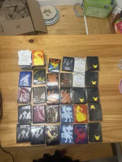 Pokemon ETB Sleeves Mixed Lot Of 28 With assorted Pokemon dividers - Image 1