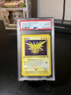 Zapdos 1999 Pokemon Card Fossil Set 1st Edition Holo Rare Vintage PSA 8 - Image 1