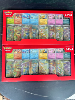 Pokemon Prismatic Evolutions 16 Mini-Tins with Promo Cards Costco - Image 1