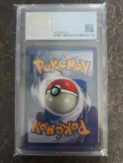 Pokemon 2000 Voltorb Team Rocket 1st Edition CGC 8.5 69/82 - Image 2