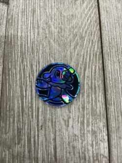 POKEMON BLACK & BLUE SHATTER POPPLIO COIN - Image 1