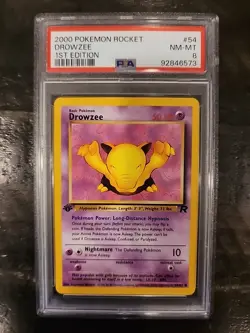 2000 Pokemon Rocket #54 Drowzee 1st Edition PSA 8 - Image 1