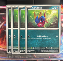 [4x Playset] Carvanha 060/094 ME02: Phantasmal Flames Pokemon TCG - Image 1