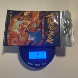 1999 Pokemon Factory Sealed Base Set Charizard Art Booster Pack Heavy - Image 1