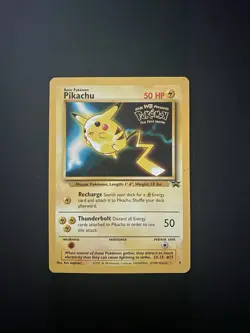 Pokemon TCG Pikachu Black Star Promo Card Pokemon First Movie - Image 1