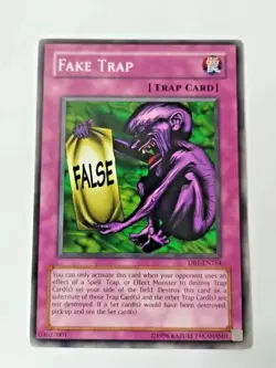 Yu-Gi-Oh! Fake Trap Dark Beginnings 1 DB1-EN164 Unlimited Common - Uncirculated - Image 1