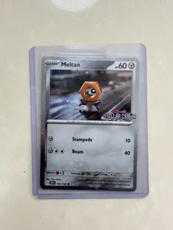 [Stamped] Meltan 102/142 Stellar Crown Stamped Cosmo Foil - Pokemon TCG Promo - Image 1