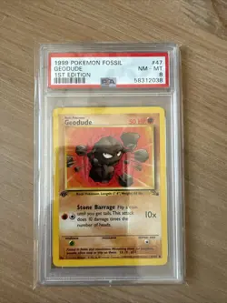 Pokemon TCG Geodude Fossil 47/62 Regular 1st Edition PSA 8 - Image 1