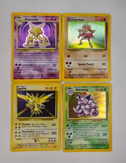 Pokemon Base Set Holo Lot "Alakazam, Hitmonchan, Nidoking, Zapdos" (M. Played) - Image 1