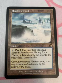 Flooded Strand (Retro Frame) Modern Horizons 3 Regular - Image 1
