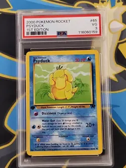 PSA 3 PSYDUCK 1ST EDITION 2000 POKEMON ROCKET #65 - Image 1