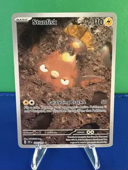 Pokemon TCG Stunfisk #202/191 Surging Sparks Illustration Rare Card - NM - Image 1