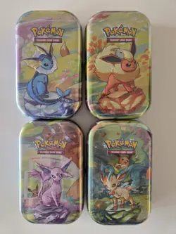 4x Pokemon TCG Prismatic Evolutions Mini Tins - NEW Sealed - Image 1