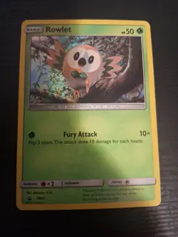 Pokemon TCG Rowlet Holo Black Star Promo SM01. 2016 - Image 1
