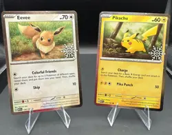 Pikachu & Eevee Stamped Promos - Cosmos Holo Pokemon TCG Holiday Calendar 2025 - Image 1