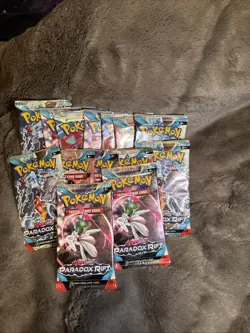 Pokemon TCG Paradox rift 14 Unopened Packages Containing 10 Cards Each - Image 1