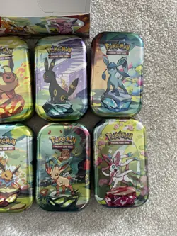 Pokemon Prismatic Evolutions Mini Tin Display Box Full Set 8 Tins Seals Tins - Image 4