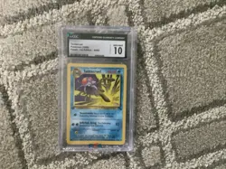 TENTACRUEL CGC 10 1999 POKEMON FOSSIL 1ST EDITION #44/62 UNCOMMON GEM MINT 8720 - Image 1
