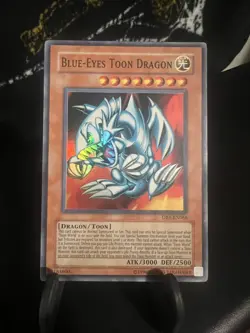 Vintage Yu-Gi-Oh Blue-Eyes Toon Dragon Card Game ATK/3000 DEF/2500 DB1-EN066 - Image 1