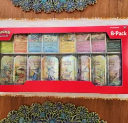 Pokemon Prismatic Evolutions 8 Mini-Tins w/ Promo Cards - Image 1