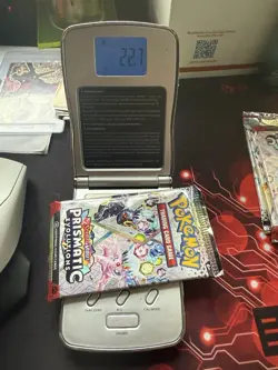 Pokemon Prismatic Evolutions Booster Pack -HEAVY 22.7g- Possible Demi/God Pack! - Image 1