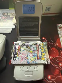 Pokemon Prismatic Evolutions Booster Pack -HEAVY 22.7- Possible Demi/God Pack! - Image 1