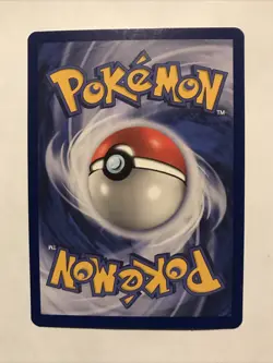 Team Rocket's Meowth Black Star Promo Pokemon Card #18 - Image 2