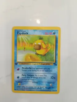 1999 Pokemon Fossil Psyduck 1st Edition no. 53 NearMint - Image 1