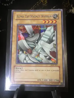1996 TCG UNLIMITED ALPHA THE MAGNET WARRIOR HOLO RARE #DOR-001 - Image 1