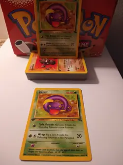 1999 Pokemon Fossil 1st Edition Ekans #46 NM-MT - Image 1