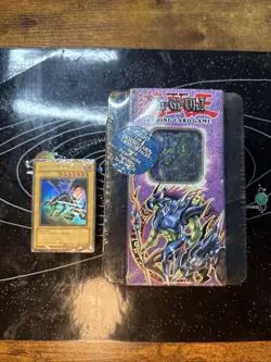 YUGIOH 2005 Exarion Universe CT2 Collector's Tin - SEALED + Sealed Red Eyes Pak - Image 1