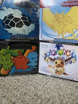 Pokemon TCG ETB Lot Sealed Paldea Evolved, Paradox Rift, Prismatic Evolutions - Image 1