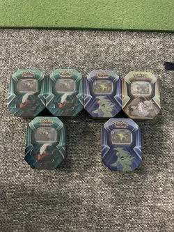 Pokemon Triple Whammy Tin Lot - Image 1