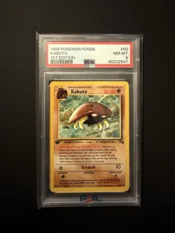 1999 Fossil Kabuto 50/62 1st Edition Pokemon Card PSA 8 Near Mint to Mint - Image 1