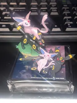 Pokemon TCG - Prismatic Evolutions Figure Collection Sleeves, Pin and Figurine - Image 1