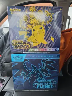 Pokemon Lot Of 2: Surging Sparks ETB and Mega Evolution Phantasmal Flames ETB - Image 1