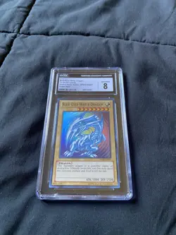 Yugioh PSA 8 Blue-Eyes White Dragon DPKB-EN001 Super Rare 2010 Kaiba - Image 1