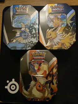 Pokemon TCG: Factory Sealed Eevee Evolutions Tins- Jolteon, Vaporeon & Flareon?? - Image 1